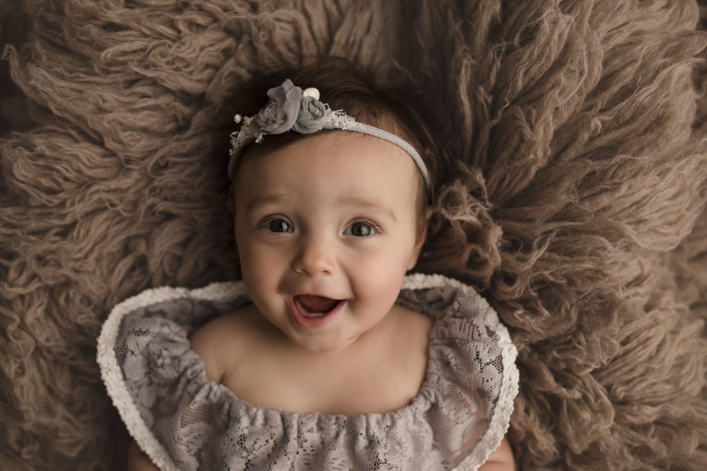 Happy face during her Carmel milestone session in Indiana.