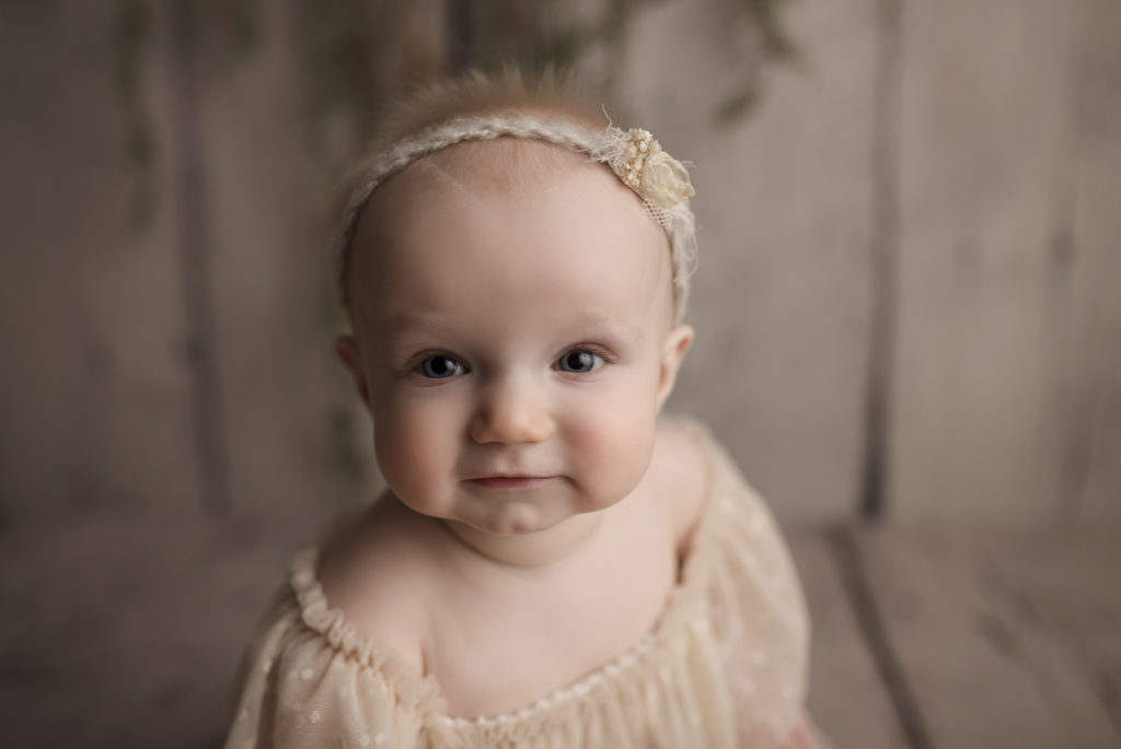 The cutest baby face at her milestone session with a Lafayette Indiana baby photographer.