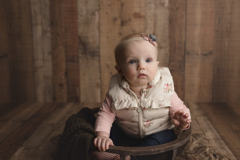 All dressed up in her cute vest for her eight month milestone session in Indiana.