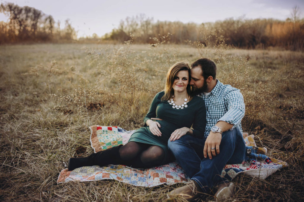 Posed on a cute quilt during their Indiana maternity session.