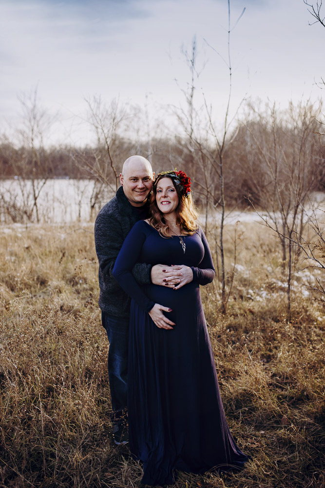 Snuggled together at their maternity photo session in Lafayette.