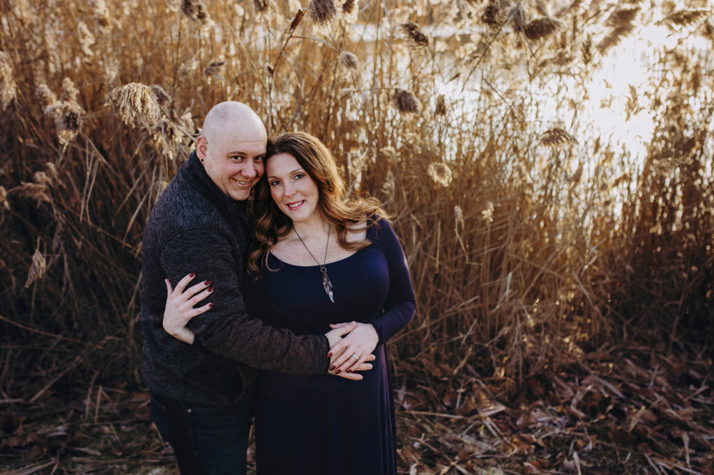 So many smiles at their maternity session at a winter location.