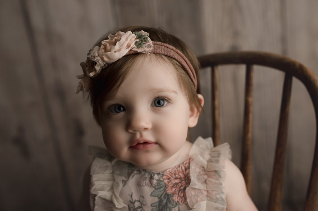 The sweetest face all dressed up for her birthday milestone session.