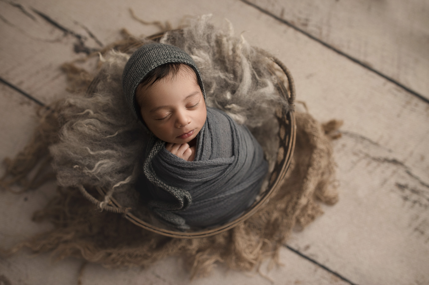 Posed perfectly at his newborn photo shoot in Indiana.