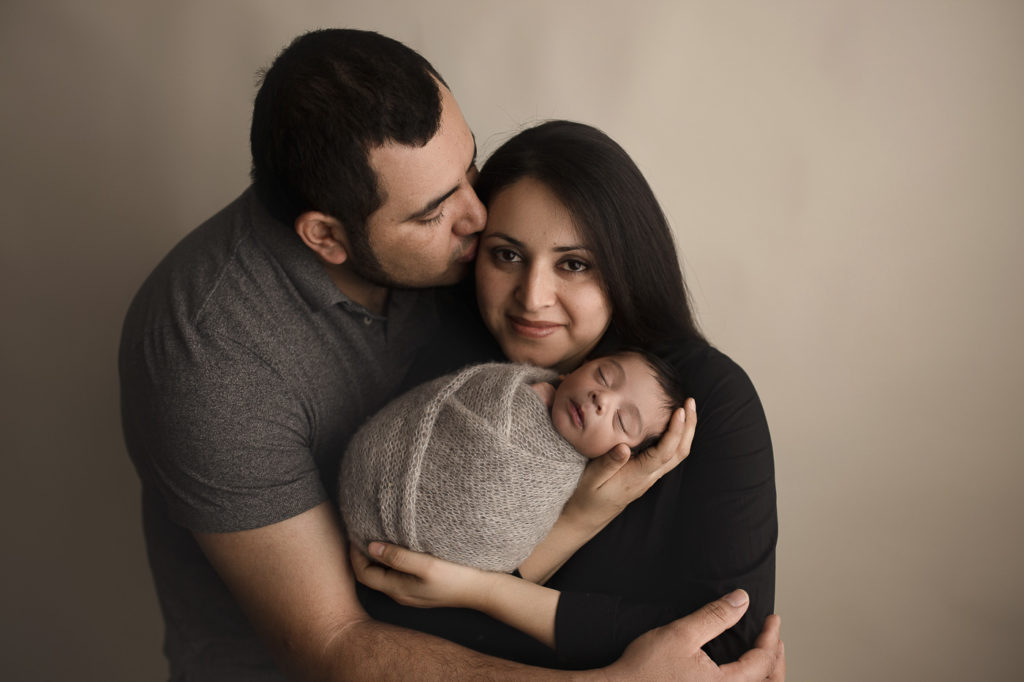 Precious family image taken at a newborn session in Indiana.