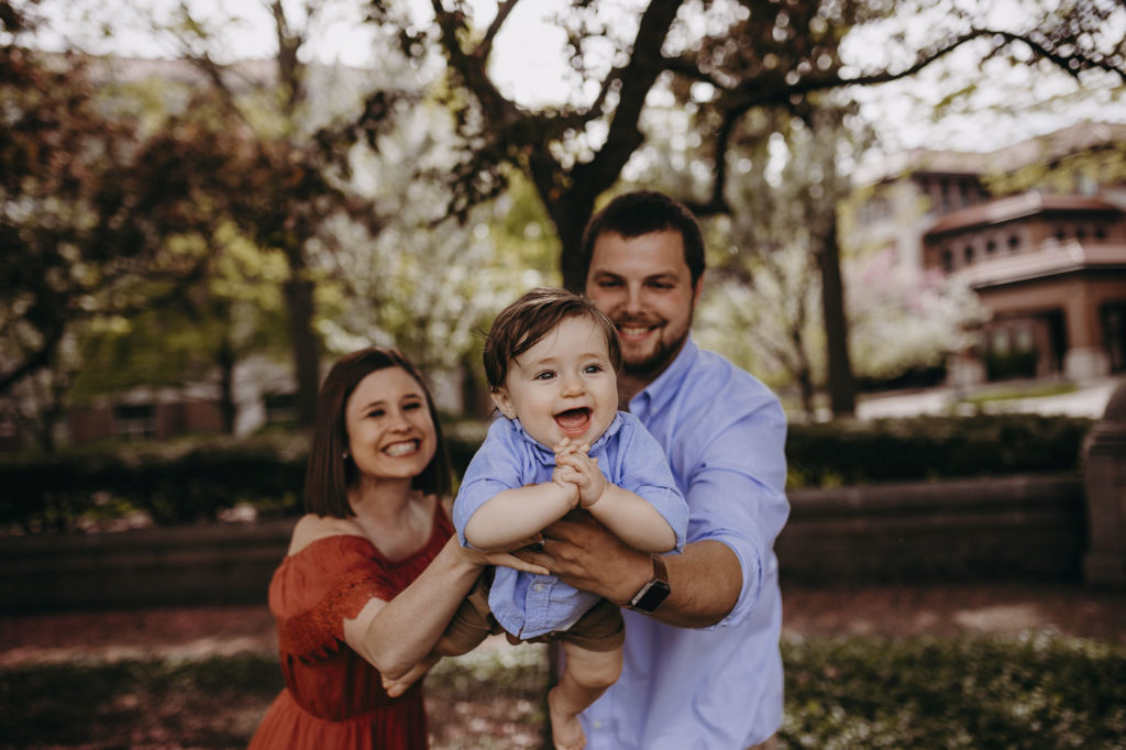 So much joy and happiness having fun with his parents at their family session.