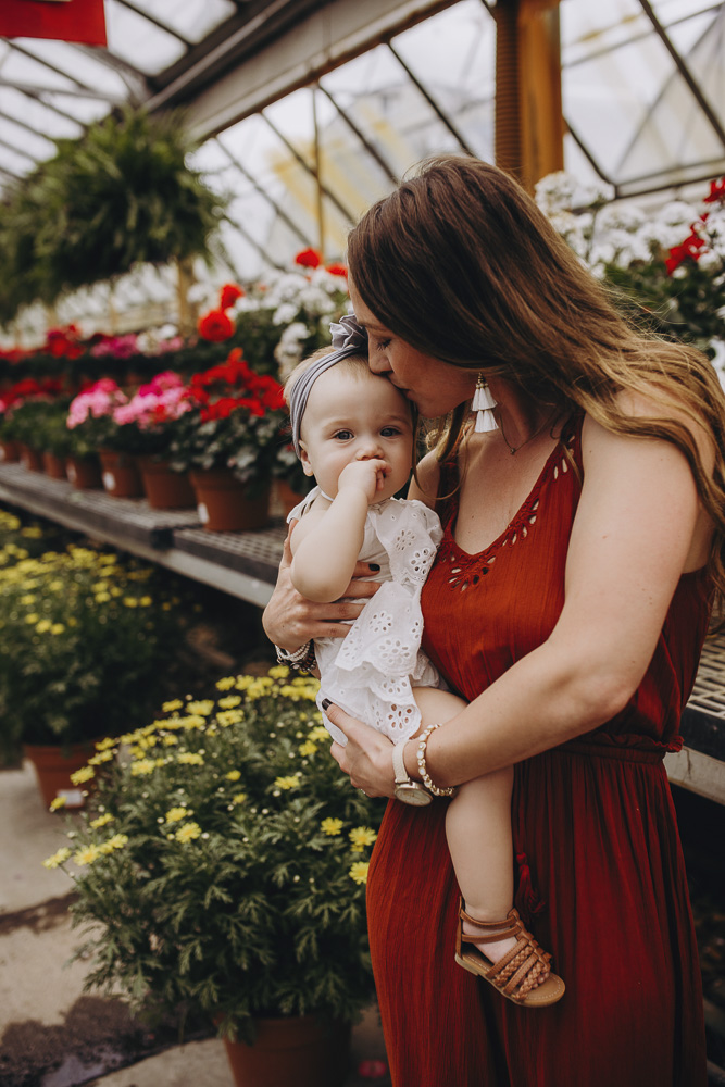 Mommy and me session in a Lafayette Indiana greenhouse.