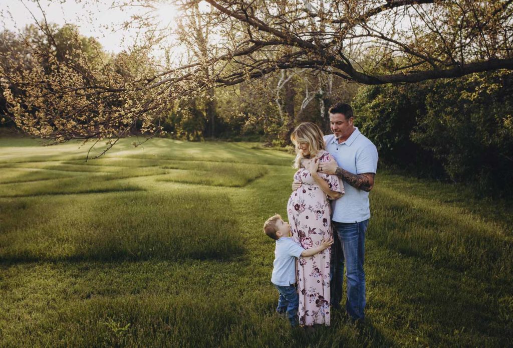 Cute family posed during their maternity session.