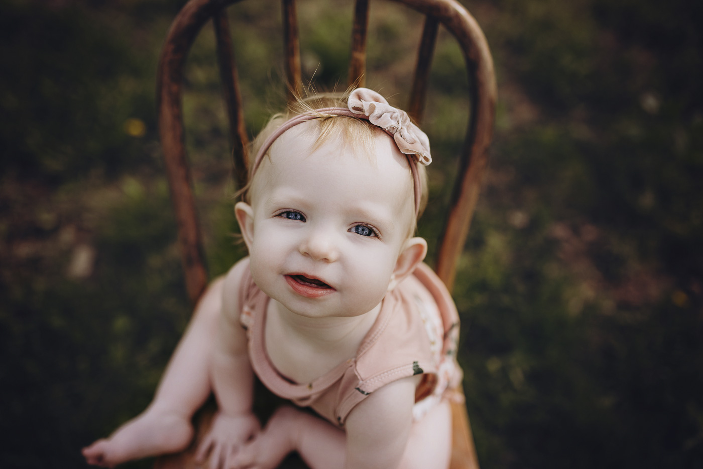 Sweet close up of cute little girl at her milestone session.