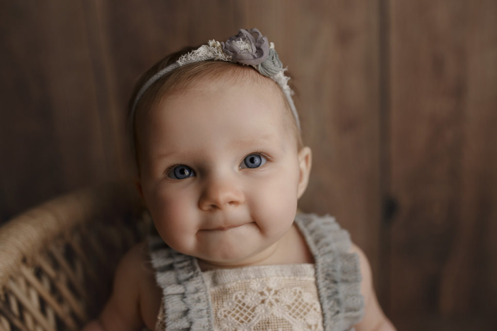 A sweet face captured during a milestone session.