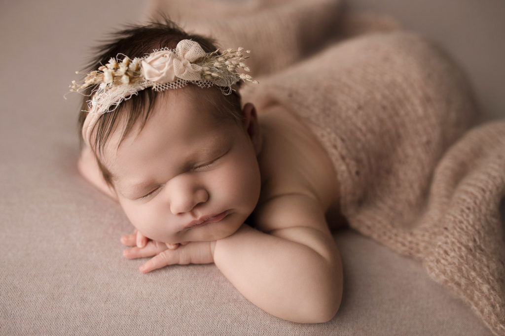 Lovely delicate headband used for baby girl's studio newborn session.