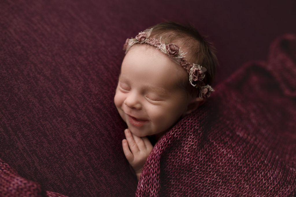 A sweet smile during her Indiana newborn session.