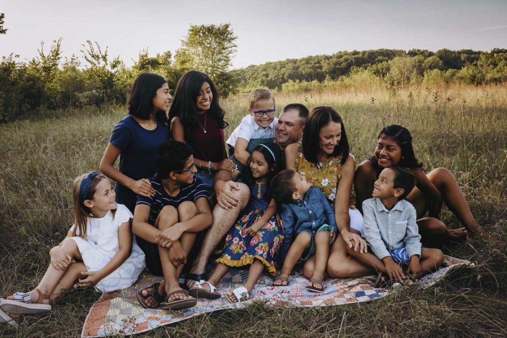 Large family posed for their summer session.