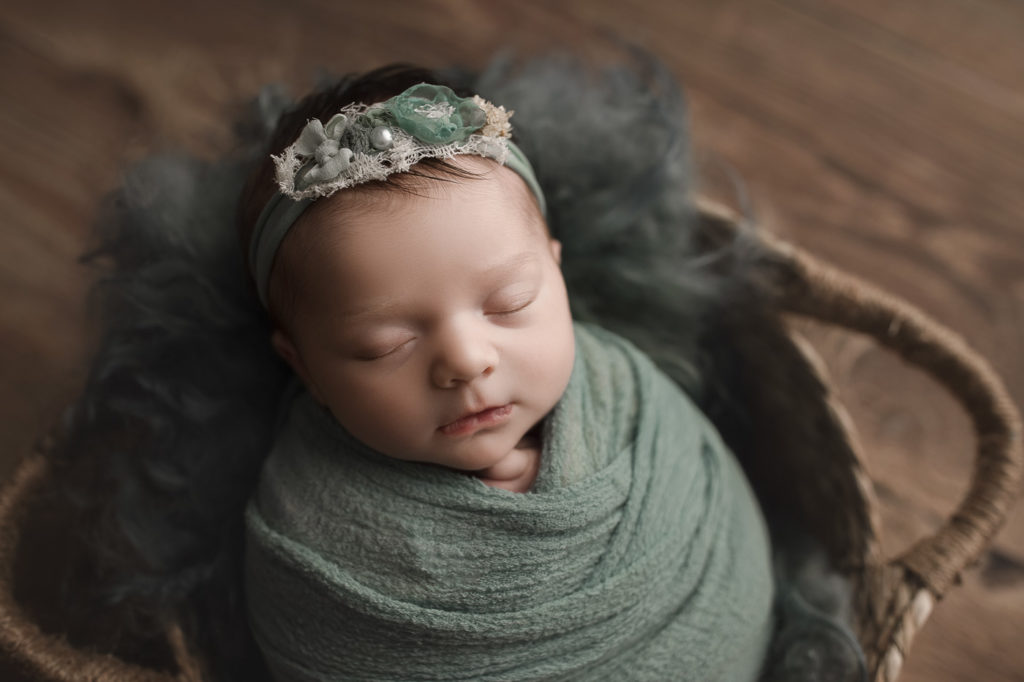 All wrapped up at her studio newborn session in West Lafayette Indiana.