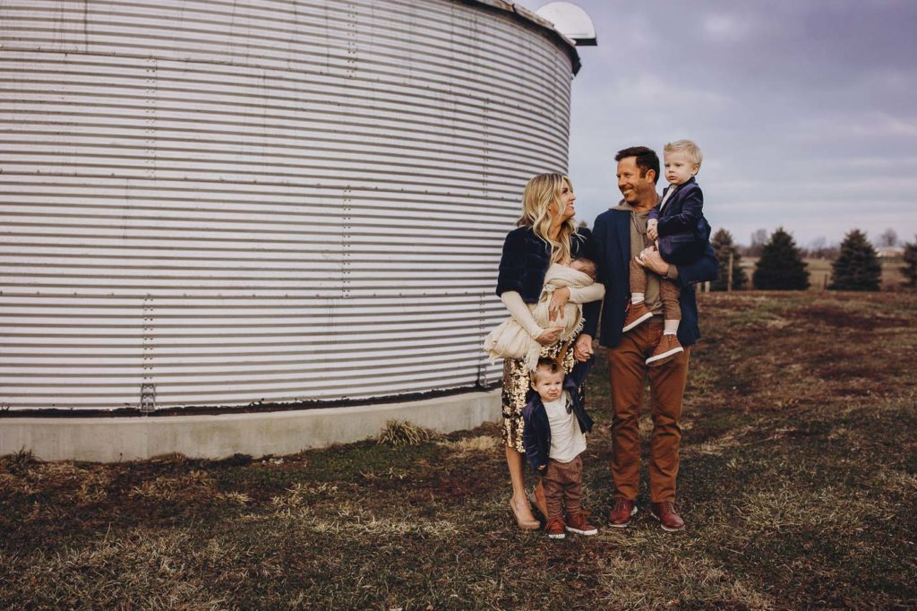 Family at their session in front of a silo in Thorntown Indiana.