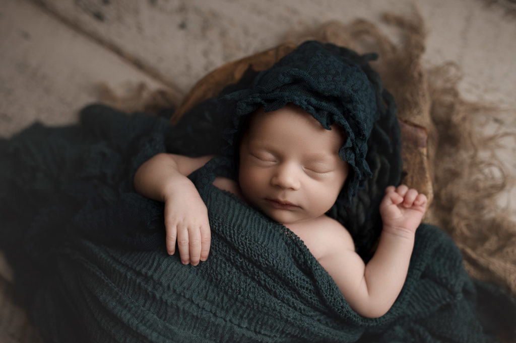 The cutest baby girl sleeping so well during her session in West Lafayette Indiana.